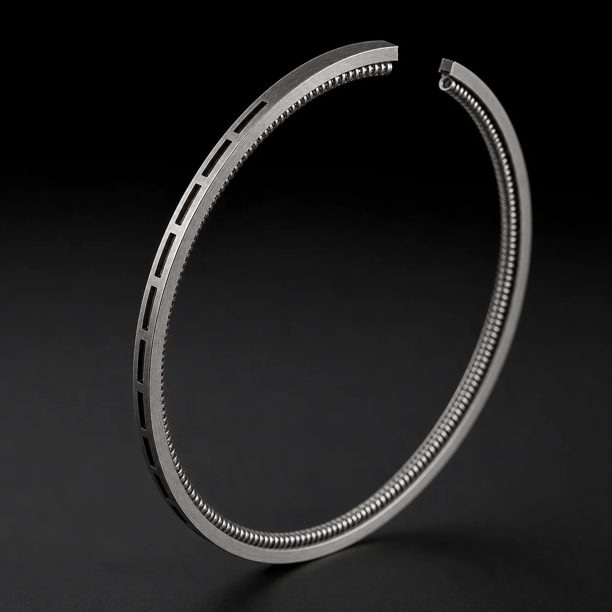2-piece oil ring: a one-piece ring body plus a coil expander behind it