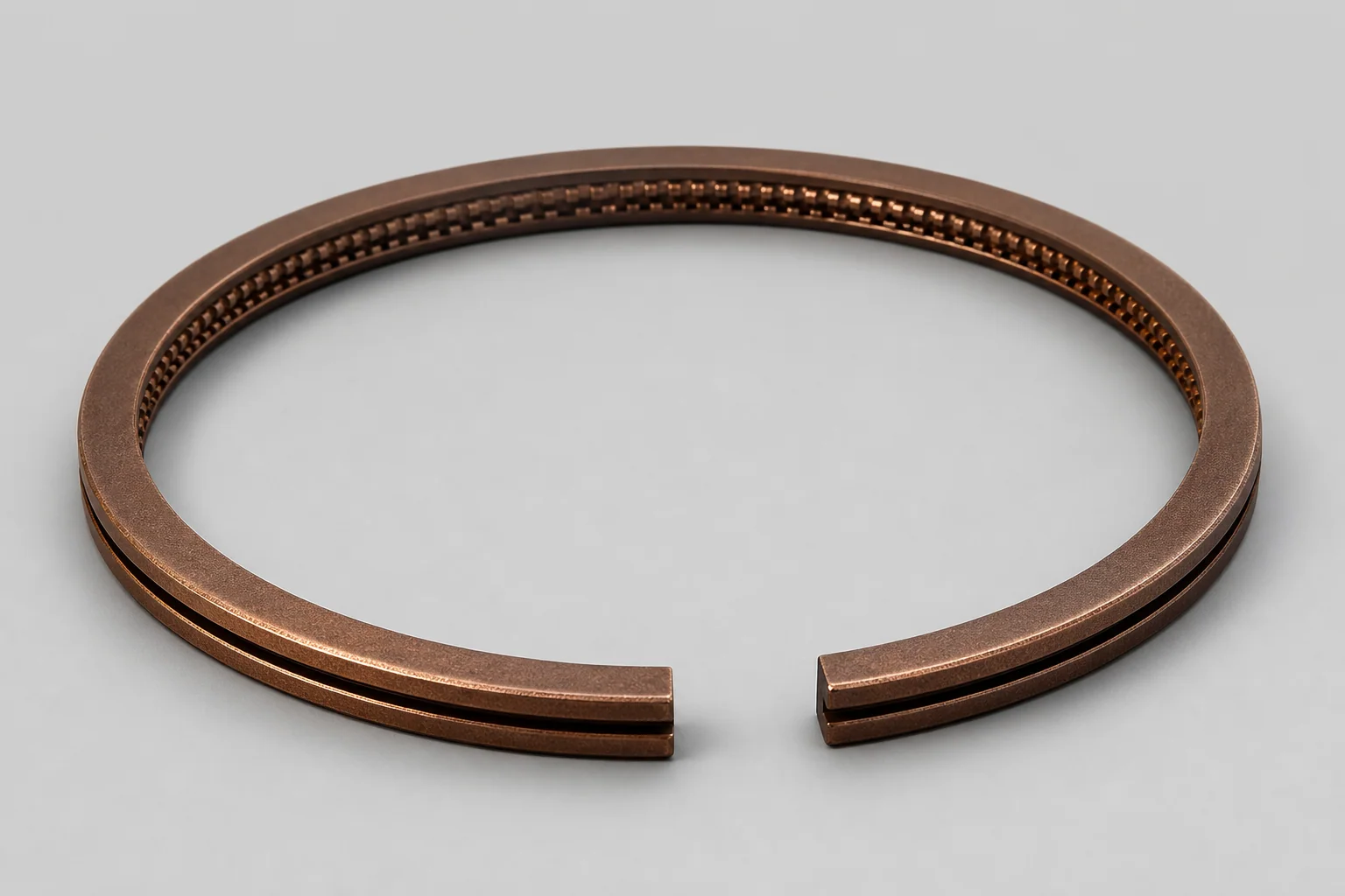 Ferroxided piston ring, bronze / antique bronze