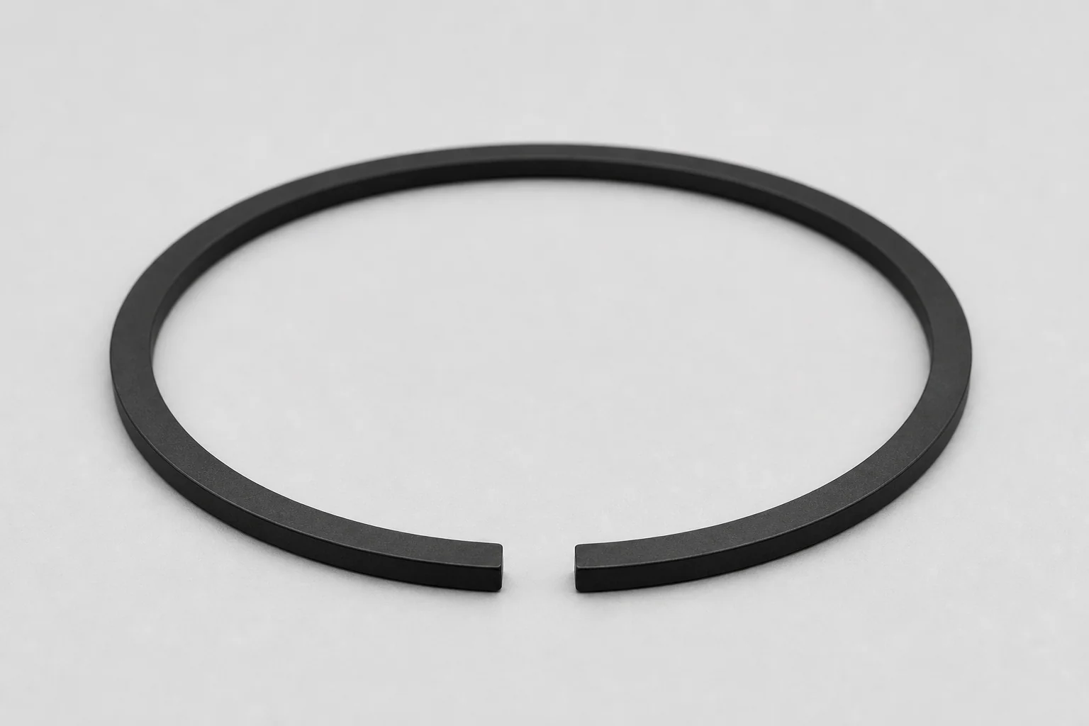 Phosphated piston ring, deep matte black